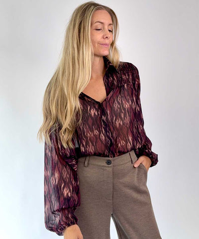 blus och byxa