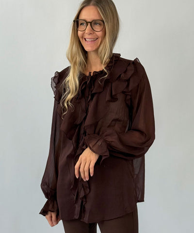 brun blus med volanger