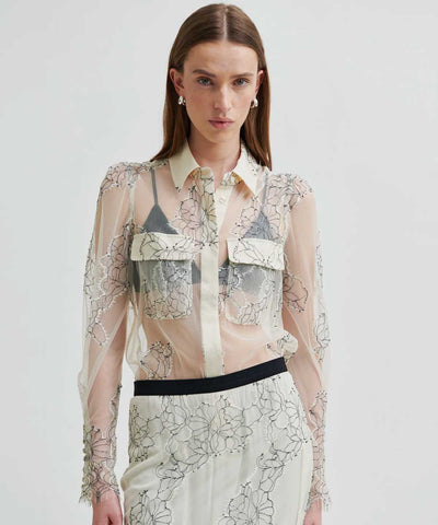 Skir blus med blommönster