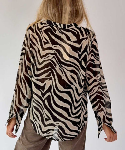 blus baksida