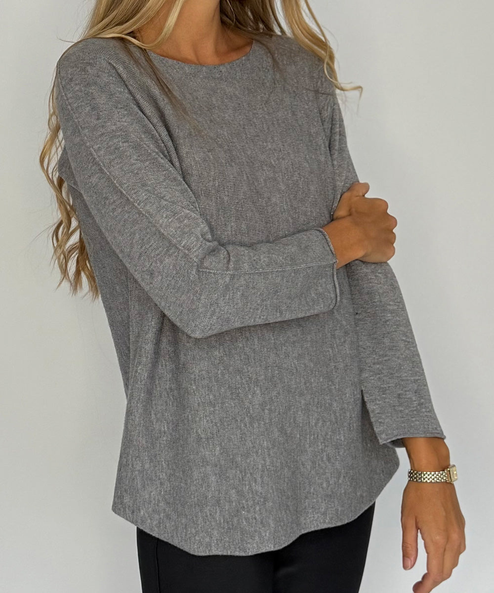 grå tröja detaljer