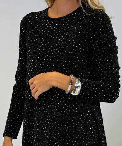 detaljer glitterklänning